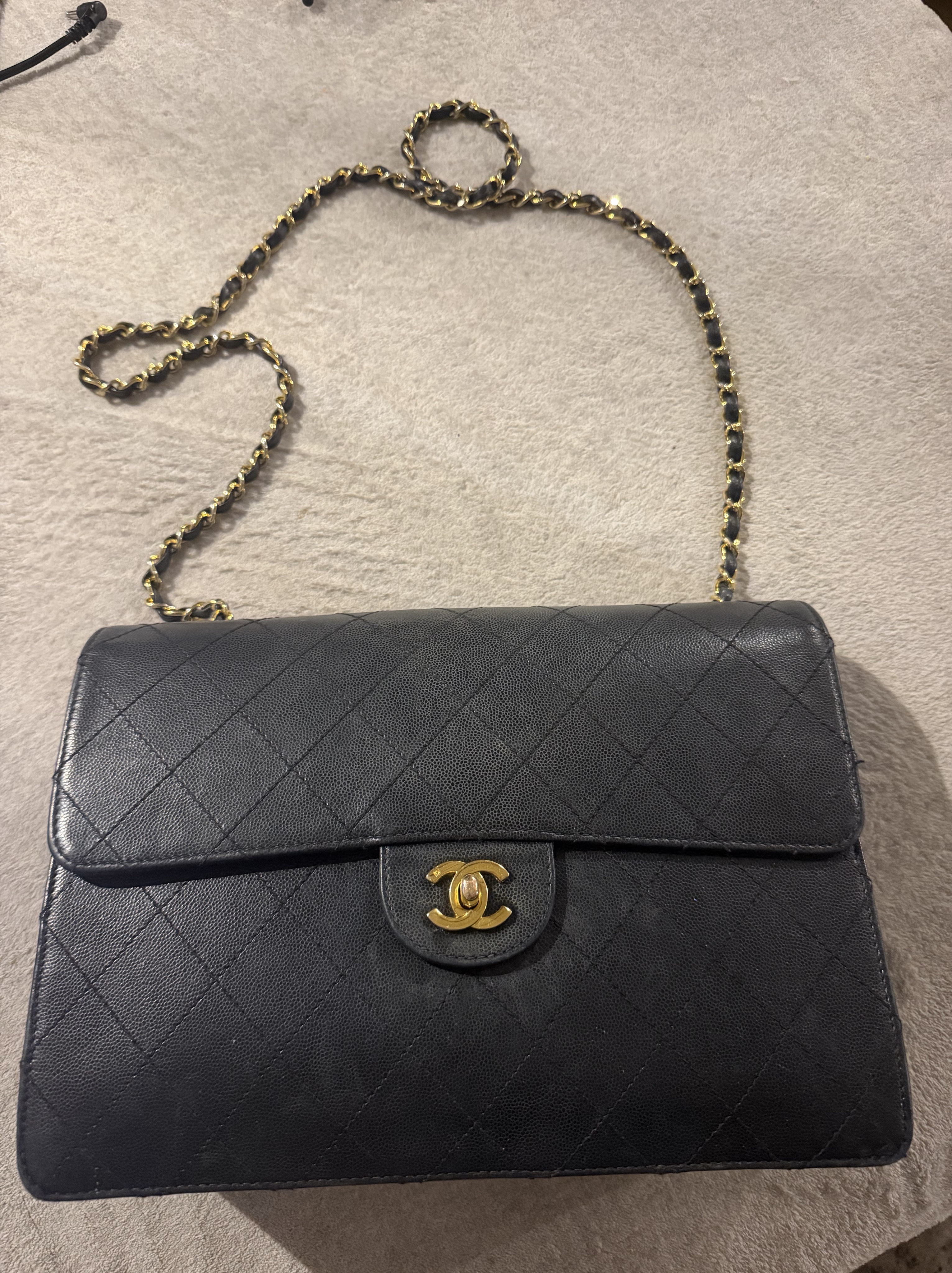 Chanel black flap bag classic gold hardware jumbo