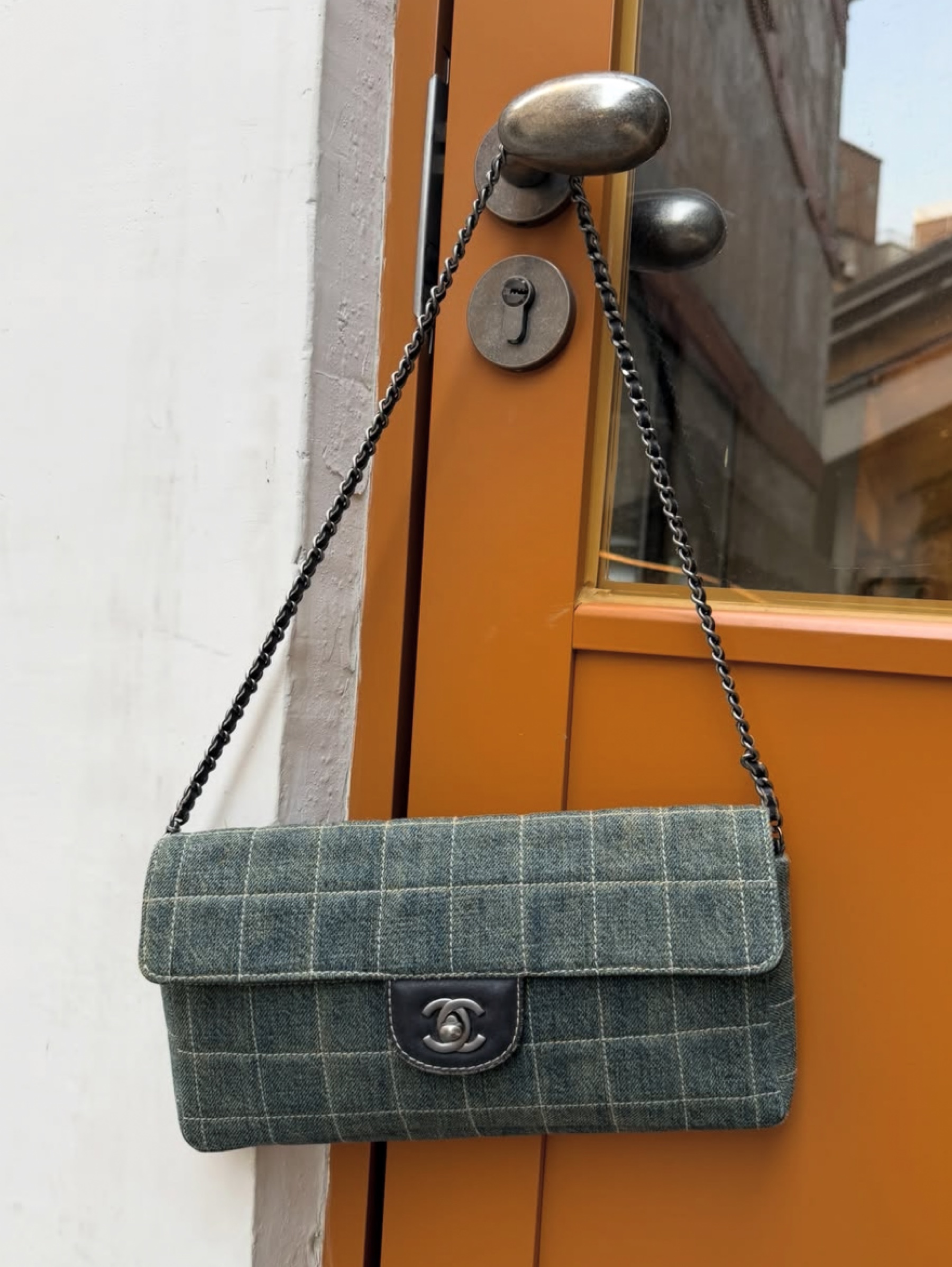 Independent designer Vintage Chanel denim chocolate bar bag available to rent