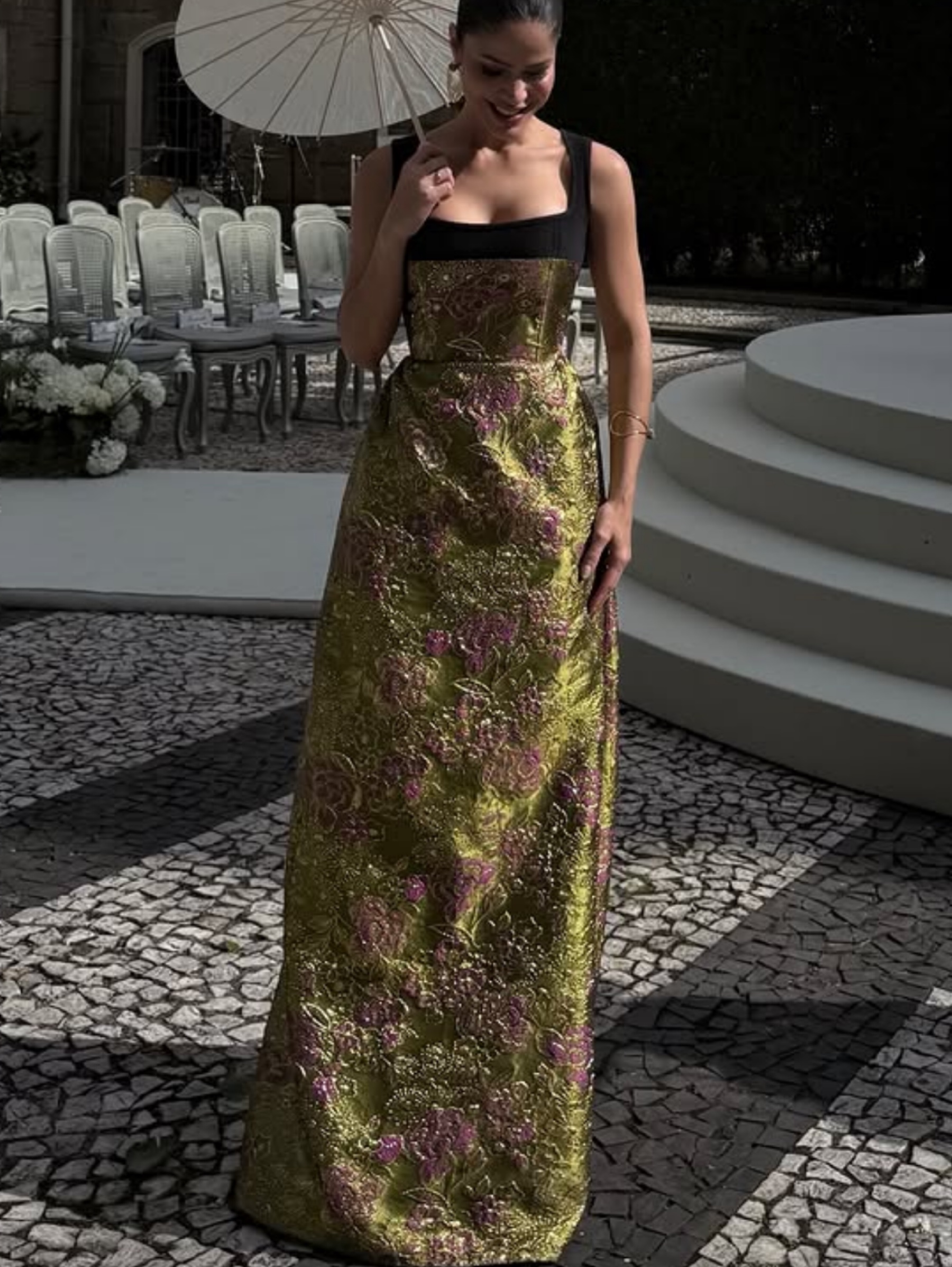 Independent designer Eera green vintage floral dress available to rent