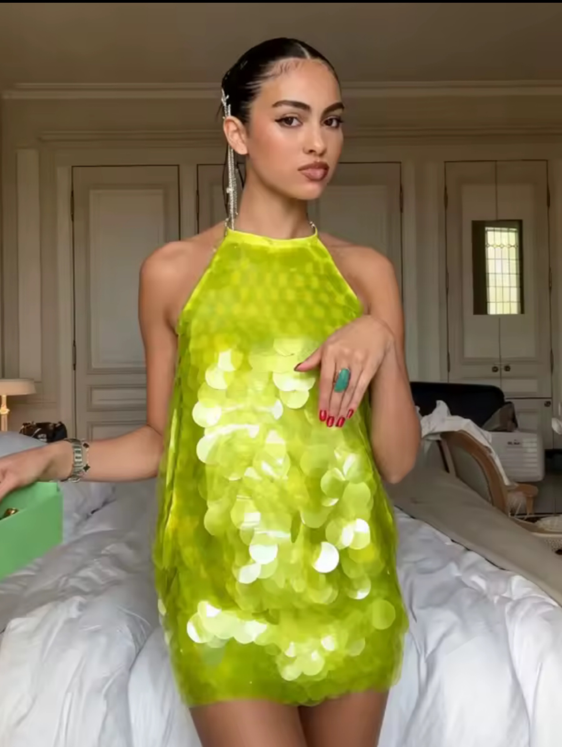Independent designer Green Party mini sequin disc available to rent