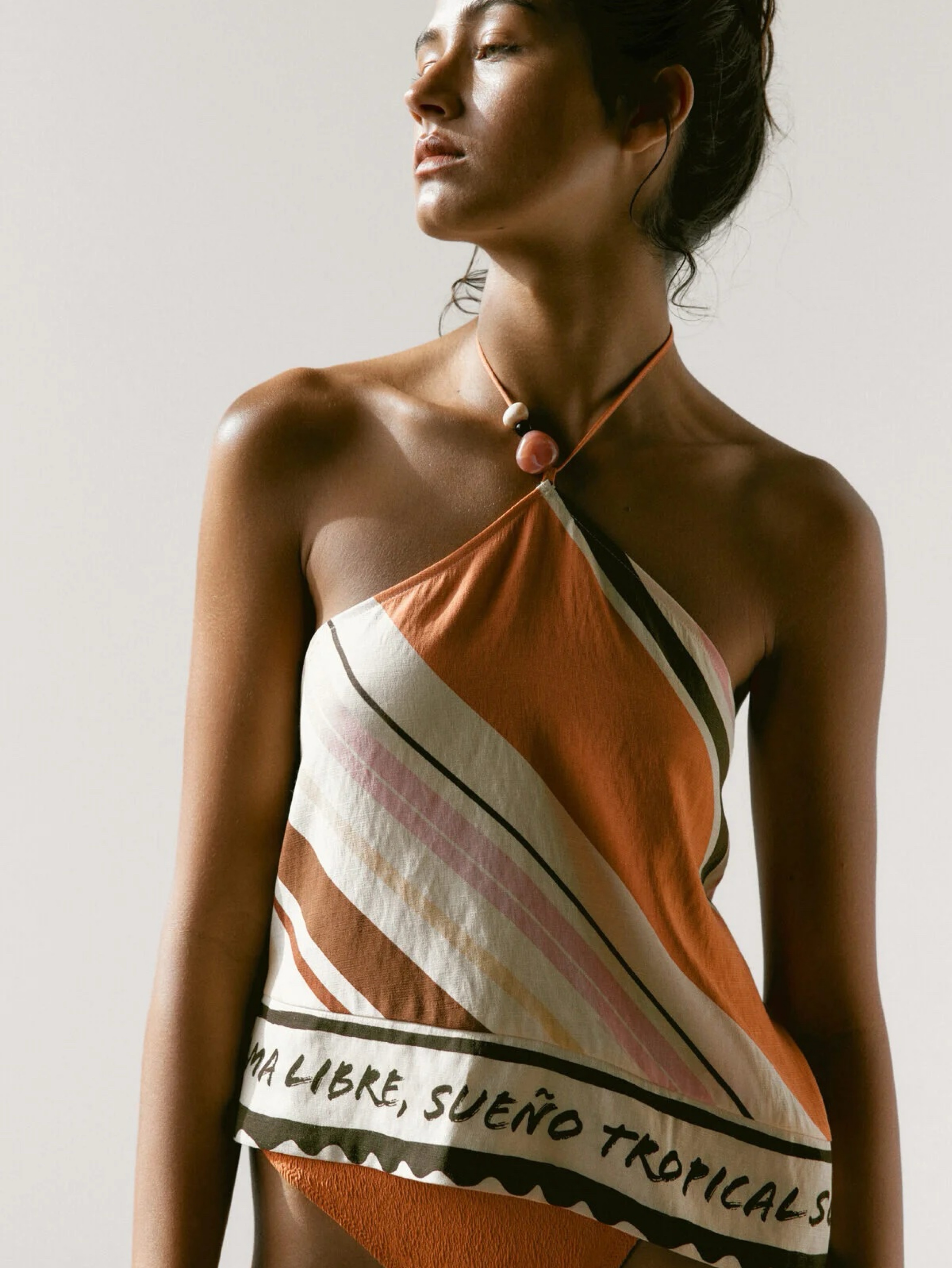 Independent designer H&M printed halterneck beach top available to rent