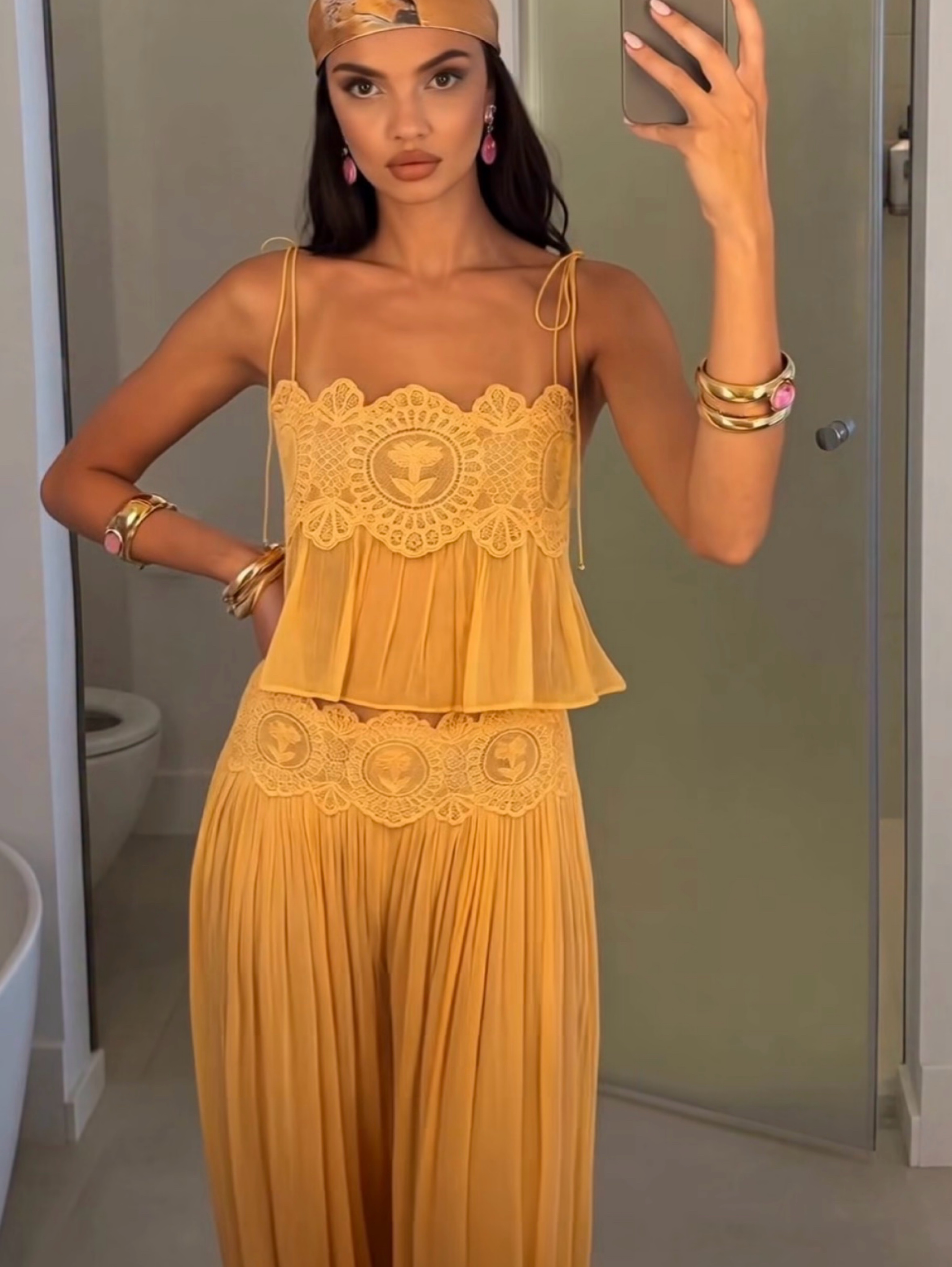 Independent designer Starburst yellow / orange two piece set available to rent