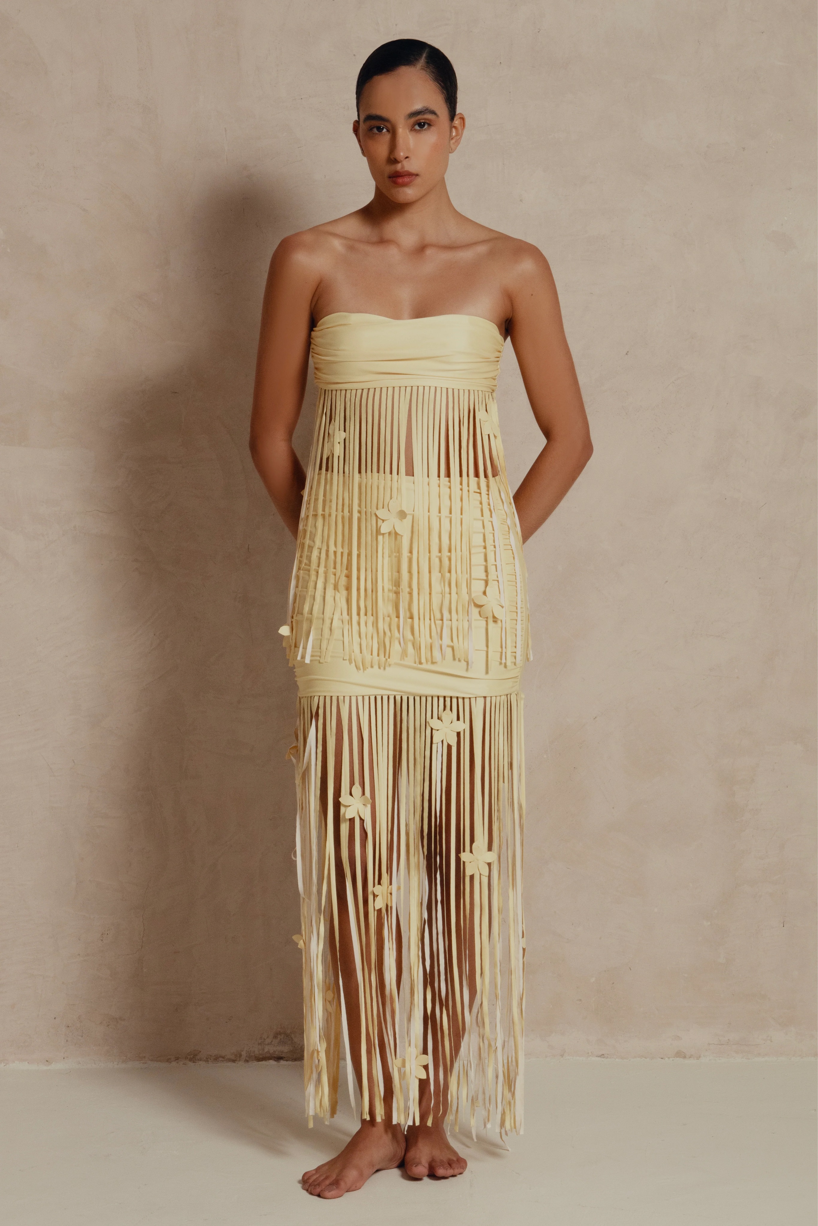 Independent designer Moo coral yellow beach fringe set available to rent
