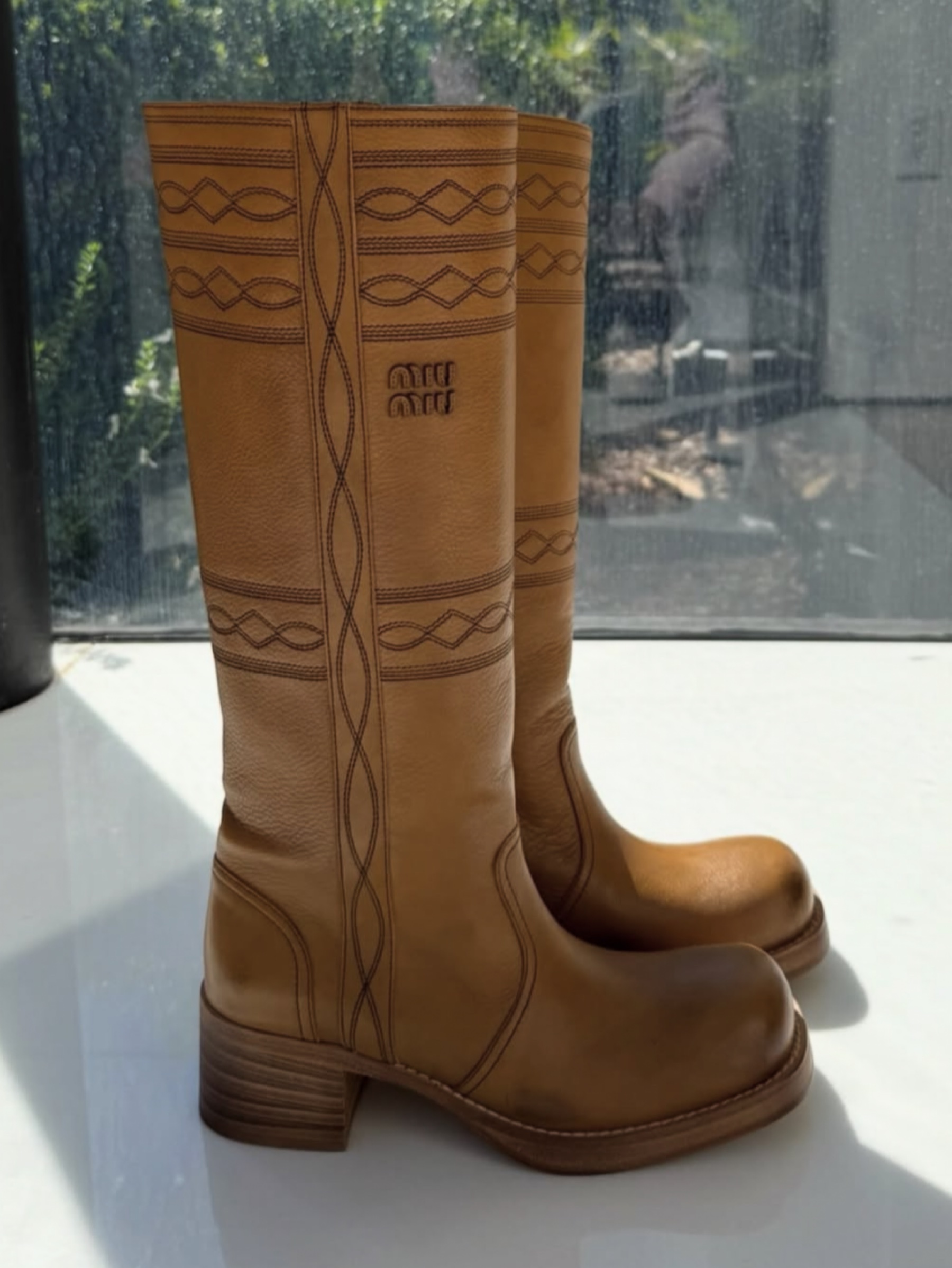 Miu Miu Miu miu boots western available to rent