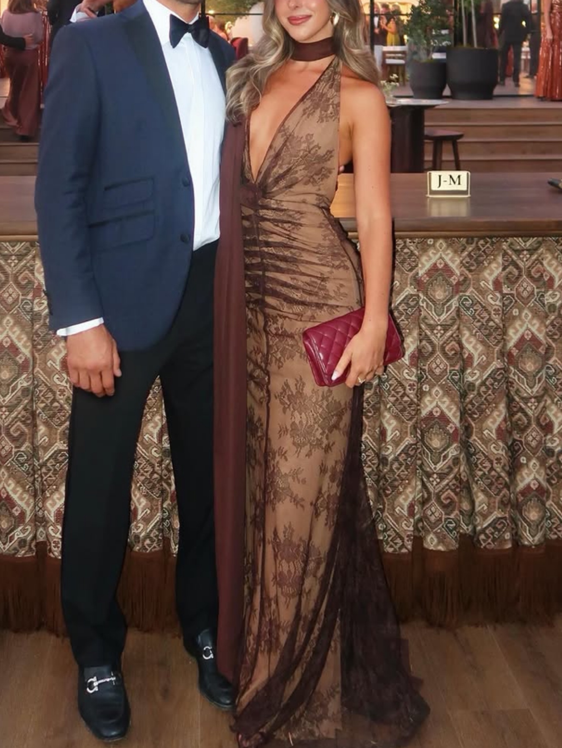 Independent designer De La Vali amora chocolate lace scarf gown available to rent
