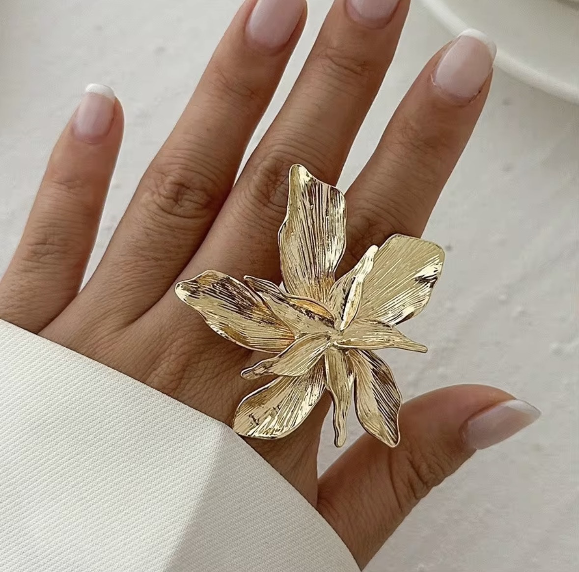 Gold flower statement ring