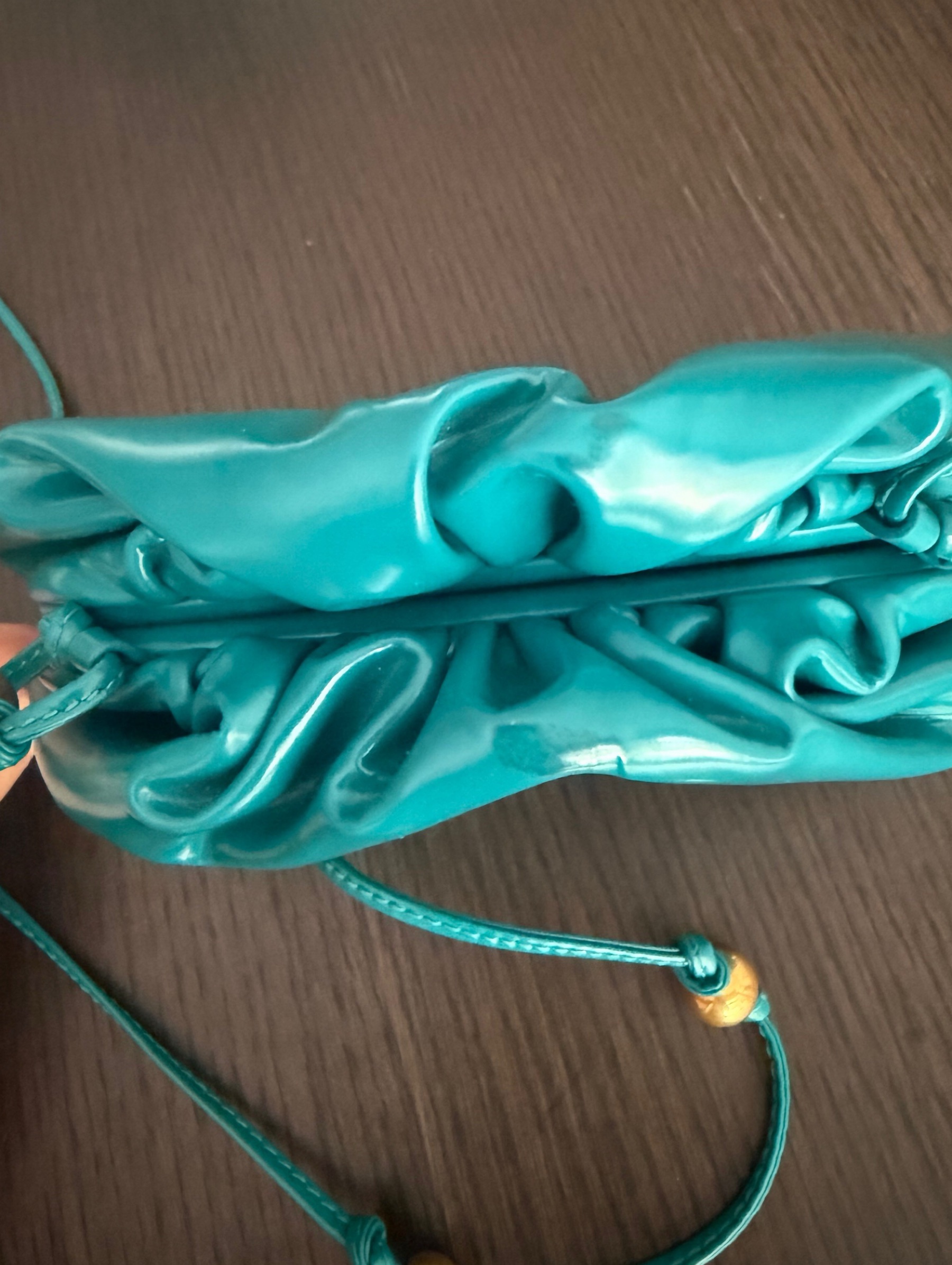 Bottega Veneta Turquoise mini pouch by Bottega Veneta | Pickle