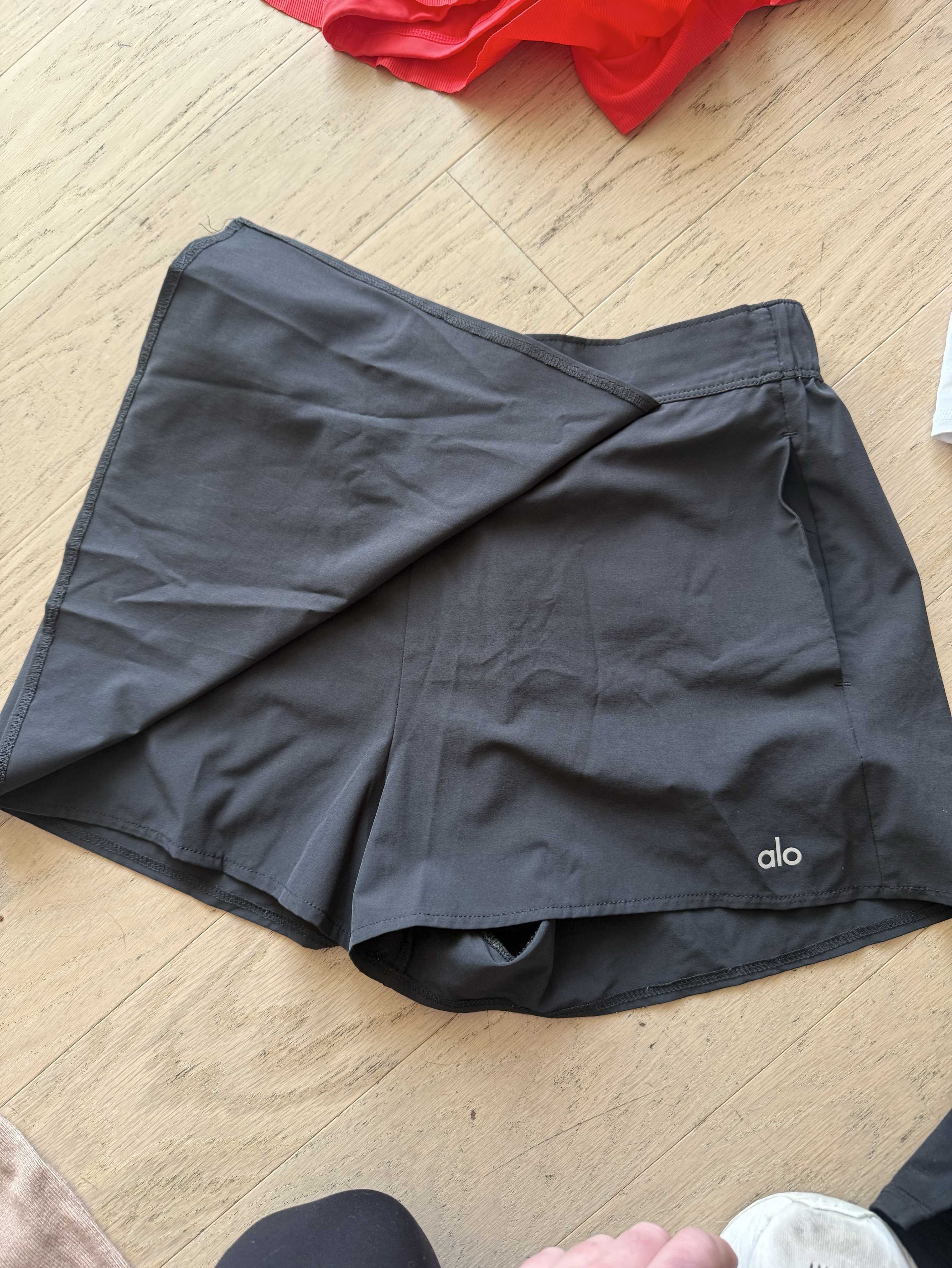 Alo Black Skort by Alo Yoga - Pickle