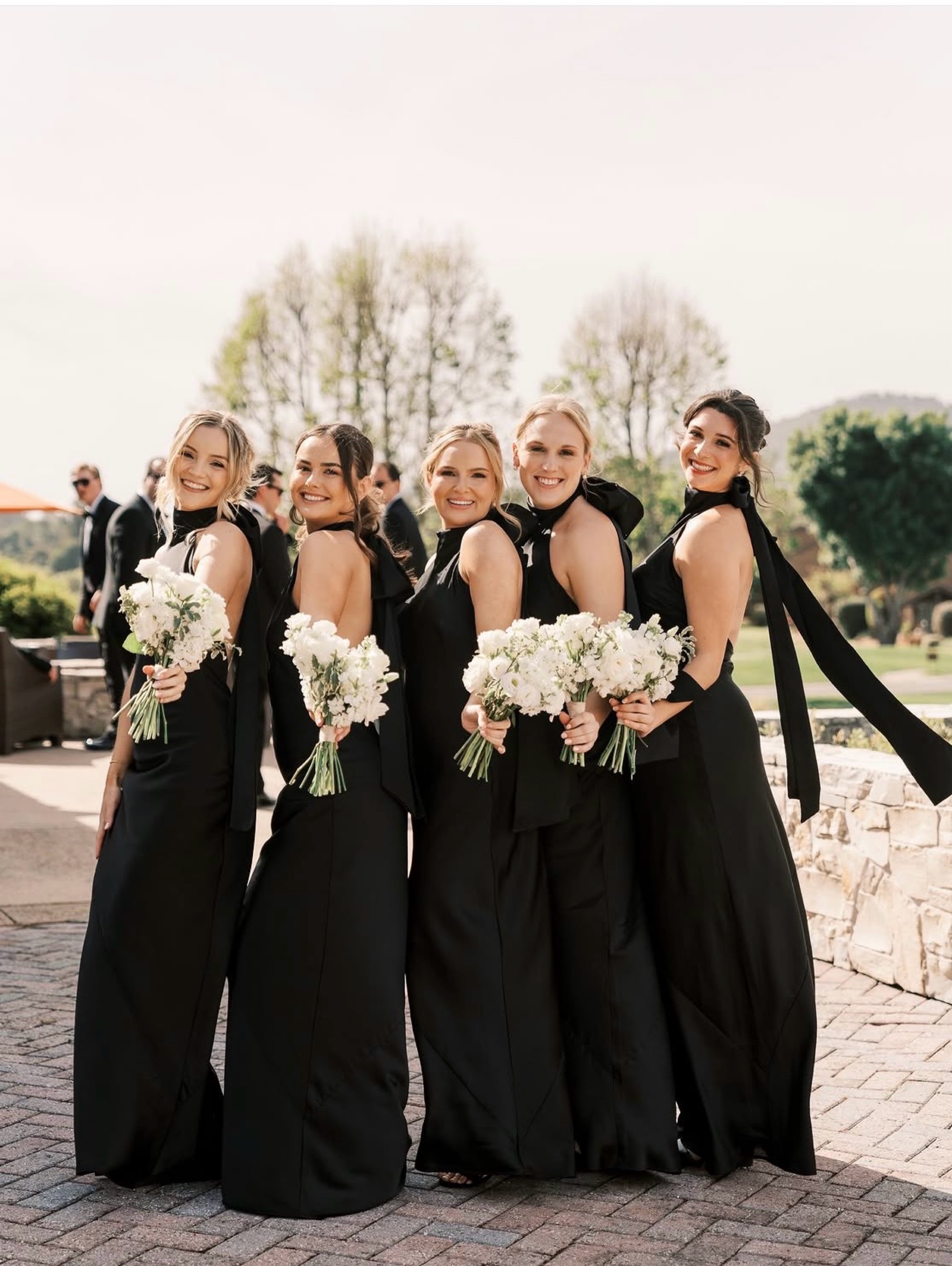 show me your mumu black bridesmaid dresses Satin Halter Maxi Gown with Statement Bow by Show Me Your Mumu weddingguestoutfits Monse Knotted Midi Dress Color:Nude Sage fluttery scarf tie