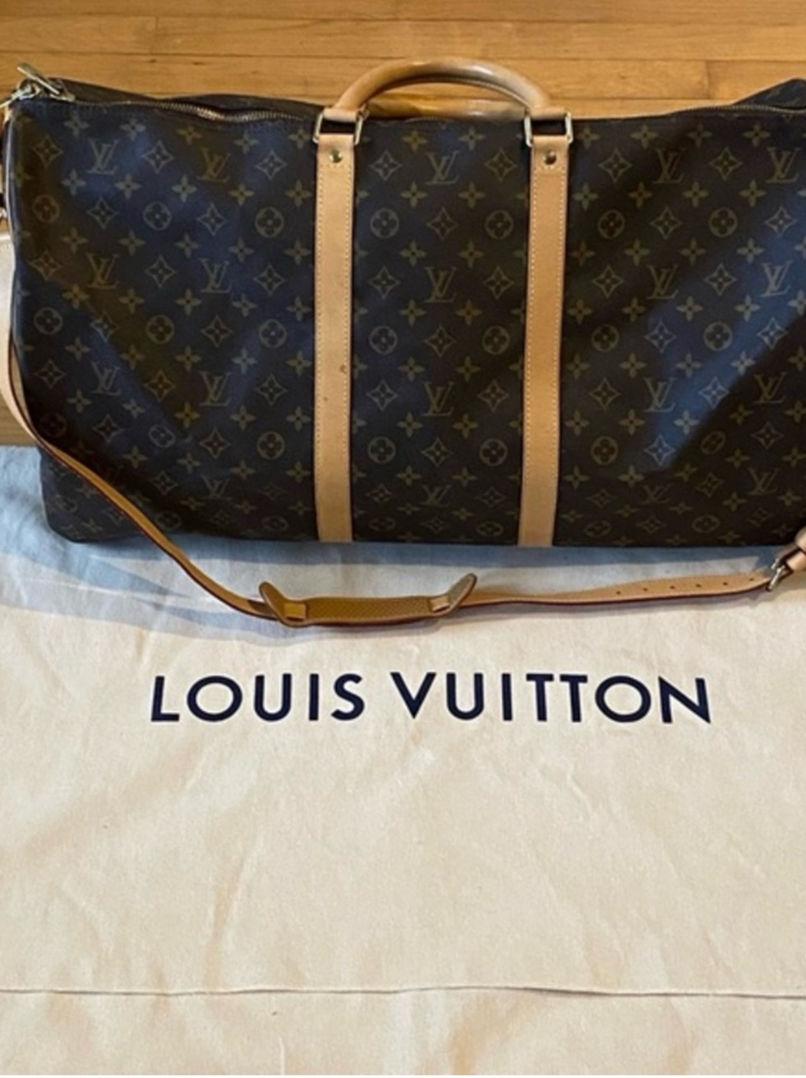 Authentic Louis Vuitton Monogram Keepall Bandouliere 60 travel duffel with strap