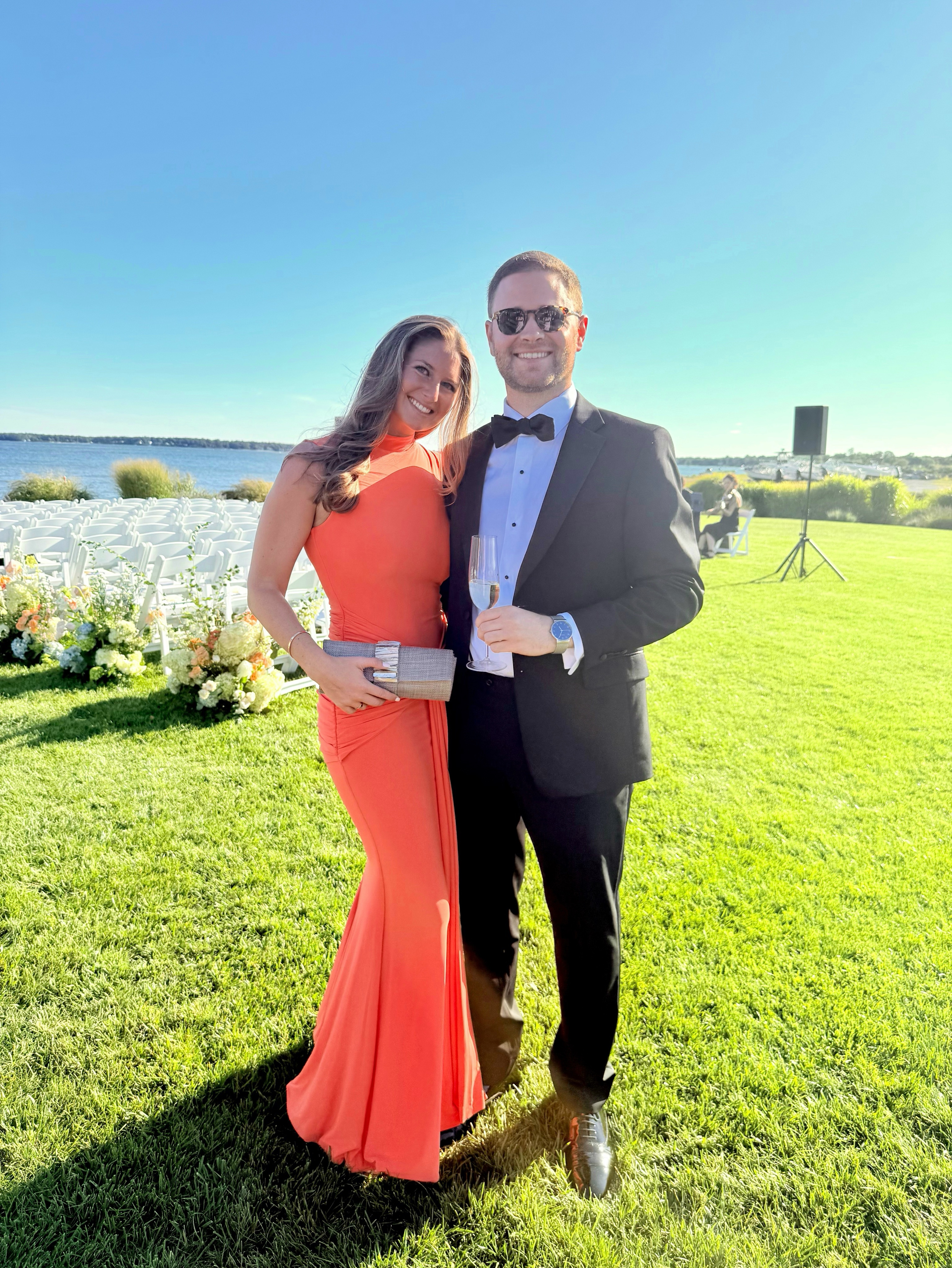 club london dress Midsize Wedding Guest Dresses from L Kianne is defined by its short cape sleeves that add a touch of elegance to this bold maxi dress Club London coral dress by