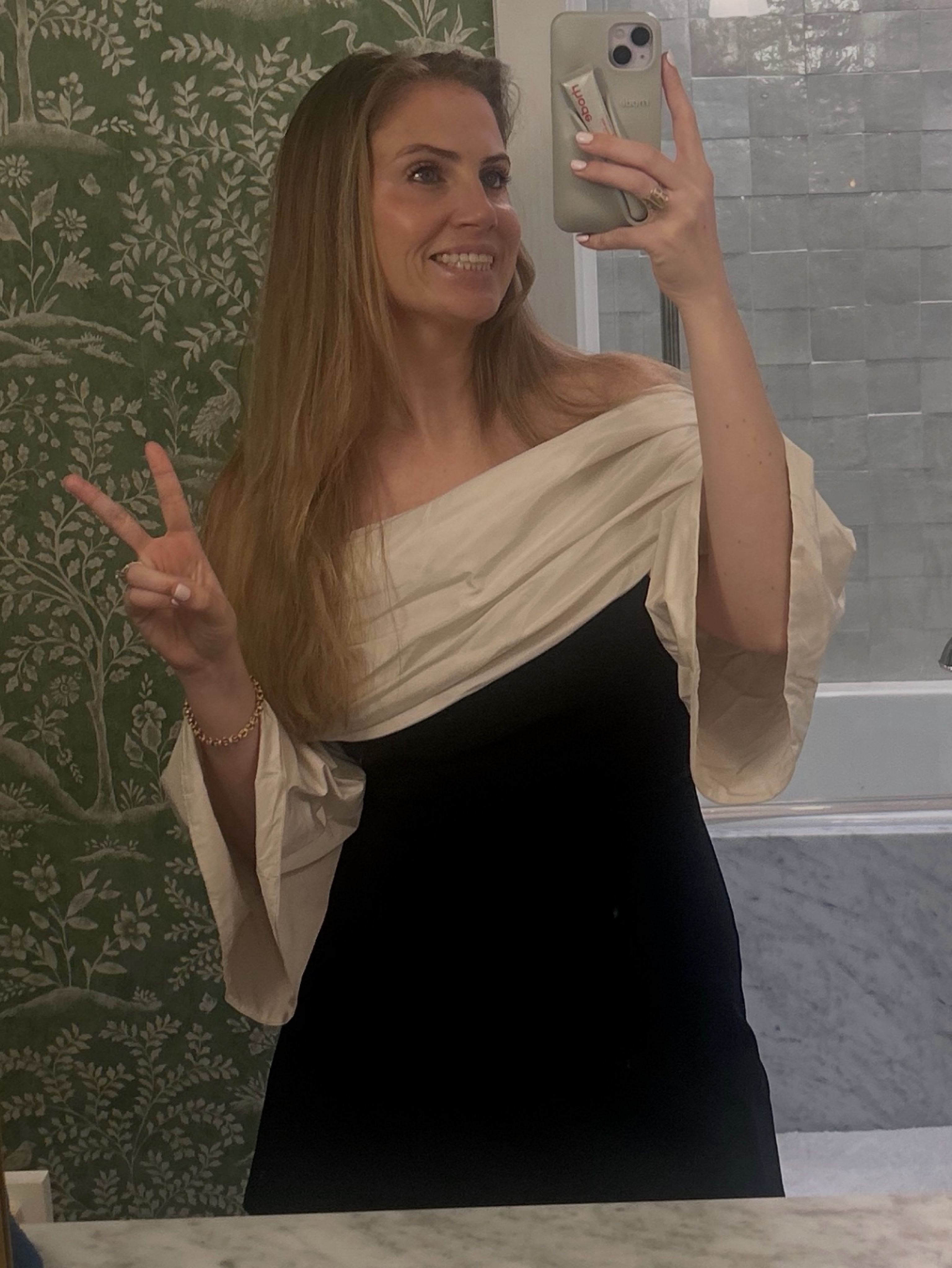 Staud black and white minidress of shoulder