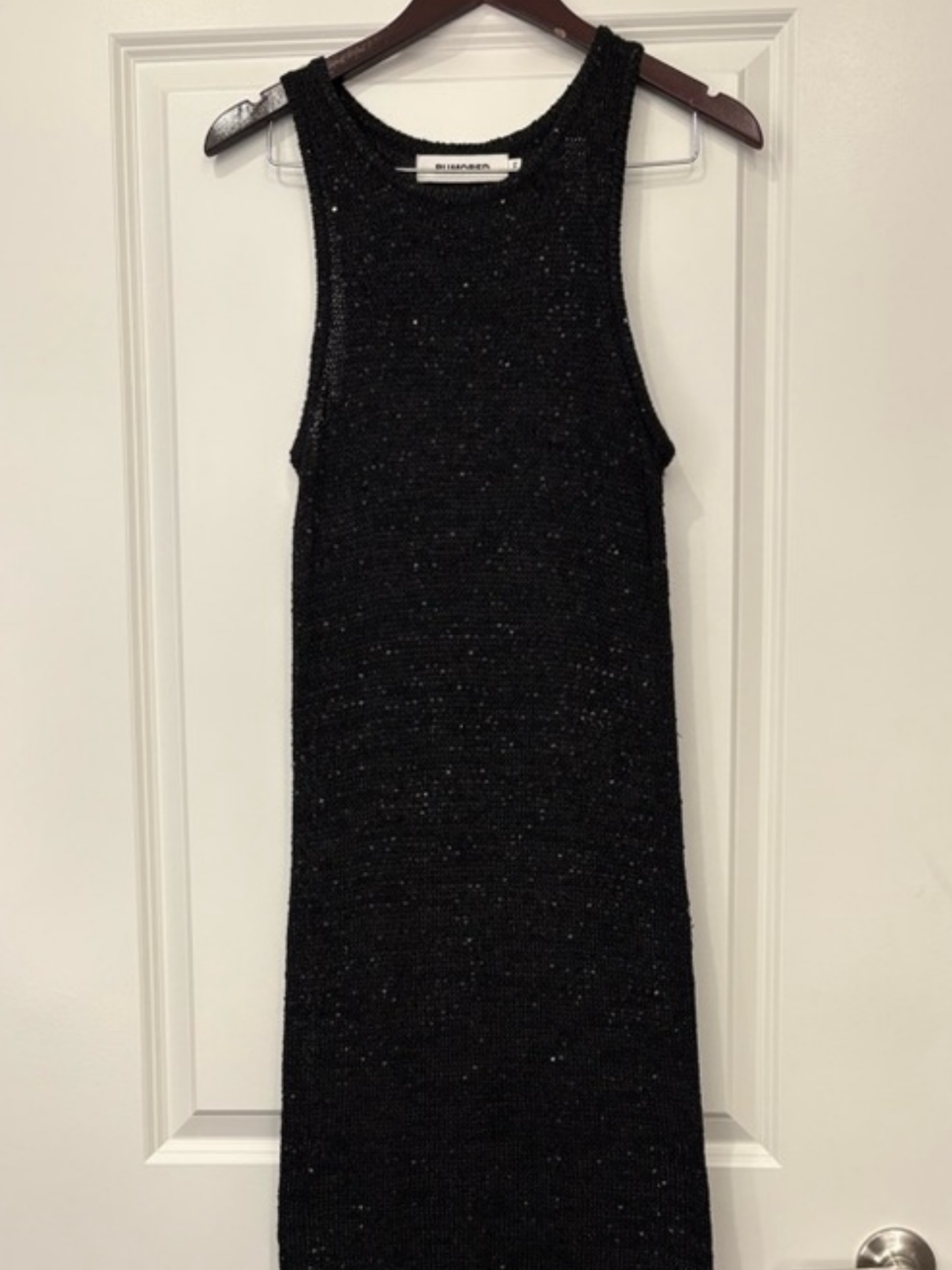 rumored black dress RUMORED