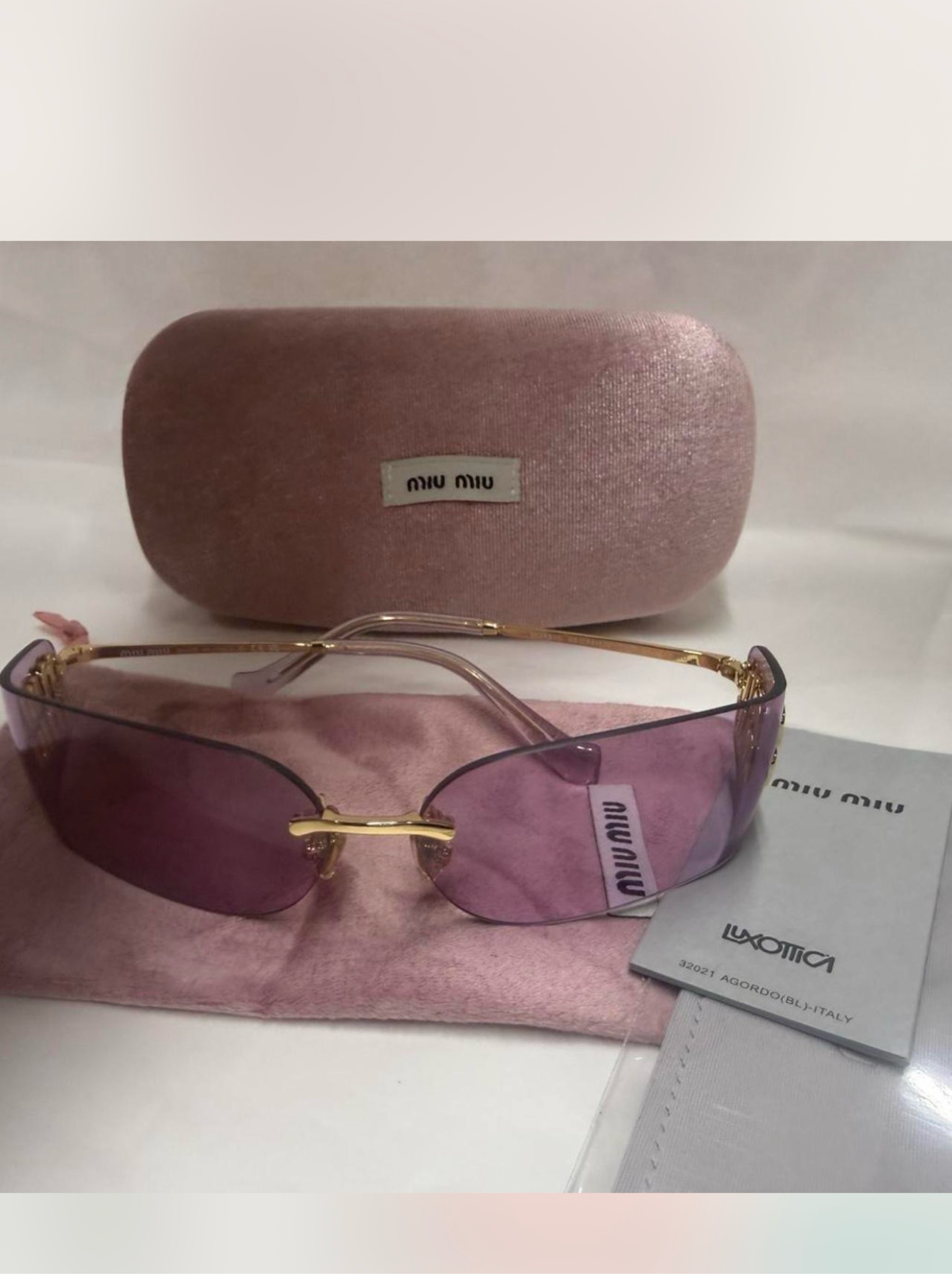Miu Miu light purple/ pink Sunglasses by Miu Miu - Pickle