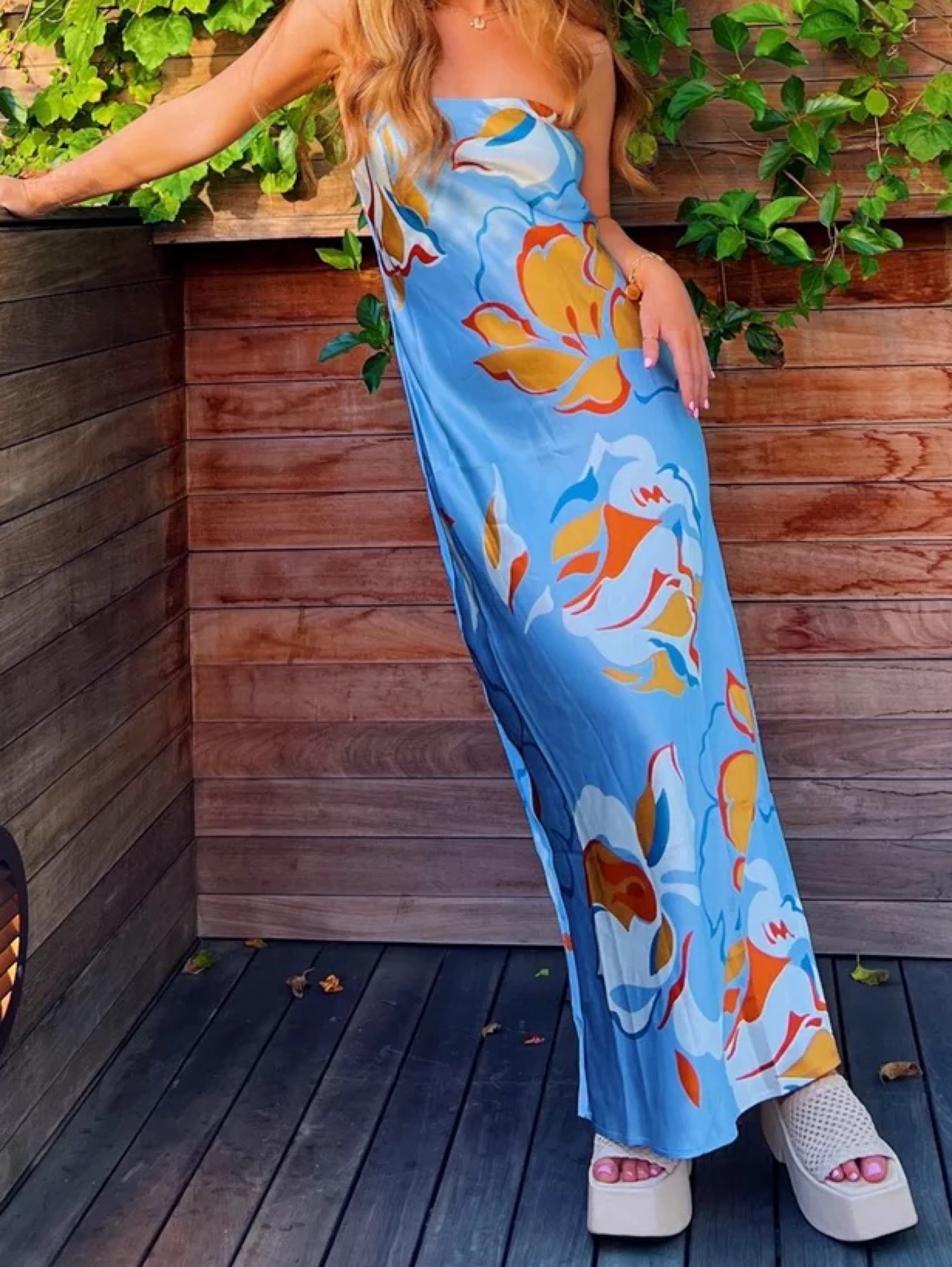 reformation blue floral midi dress Reformation Riva Smocked Puff Sleeve Midi Dress at MarketFair Shoppes in Princeton, NJ