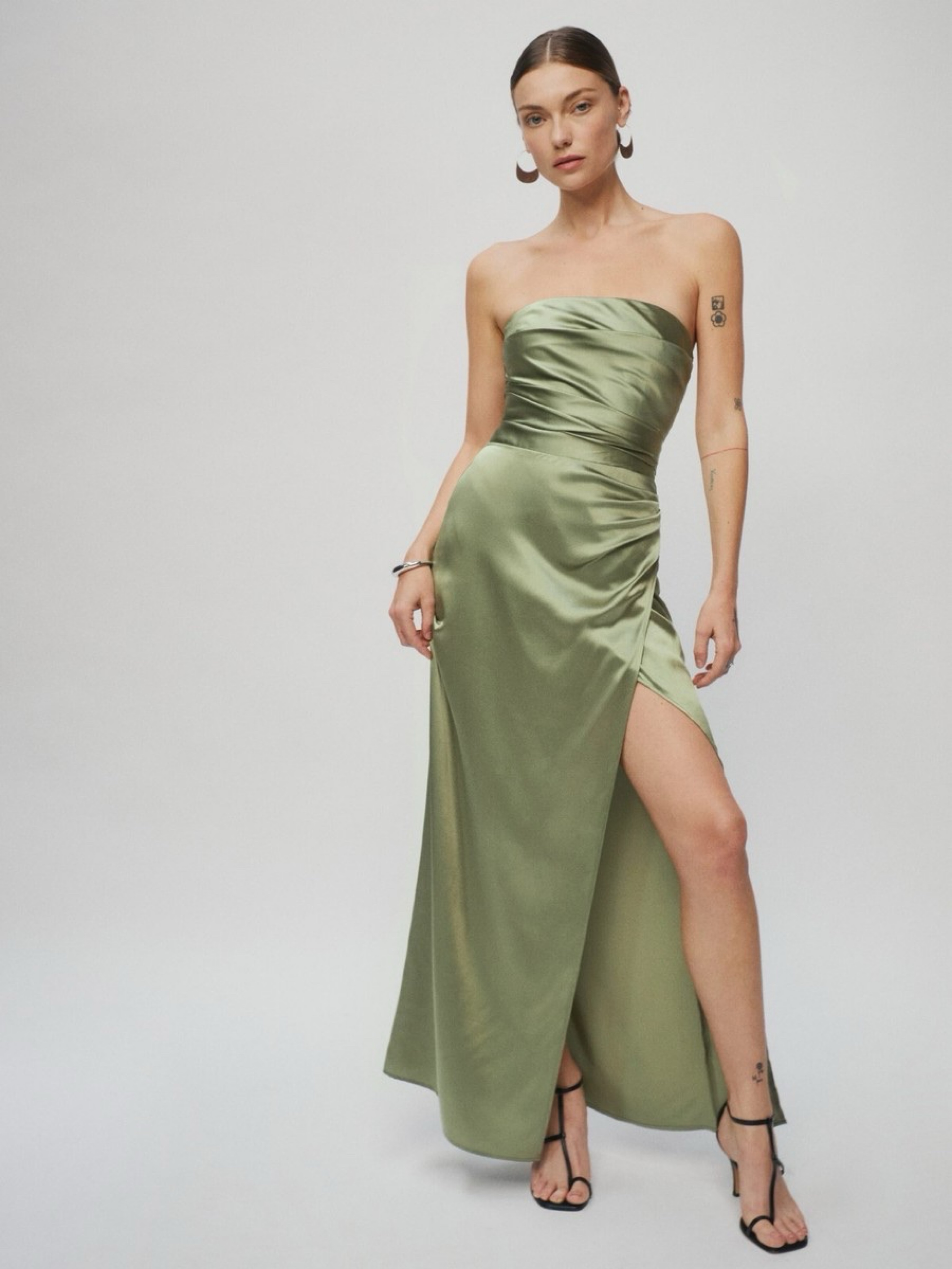 reformation green bridesmaid dress WEDDING TREND Bridesmaid dresses change the look and feel of the photos. We  loved these mismatched green floral dresses Kathleen's bridesmaids picked.  Loving the pattern in pattern look. Bridesmaid dresses are from @